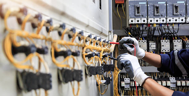 Professional Electrician technician working in Lake Fenton, MI